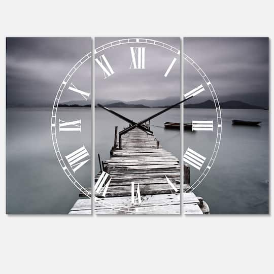 Designart 'Pier And Boats At Seashore Beach Style Multipanel Wall Clock